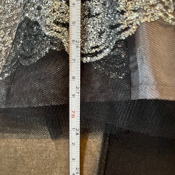 Gorgeous black knee length dress with sparkle design around the skirt. - Picture 5 of 7